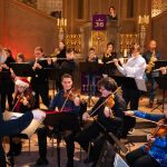Gruppenfoto des Orchesters Elo-Symphonics beim Weihnachtskonzert.